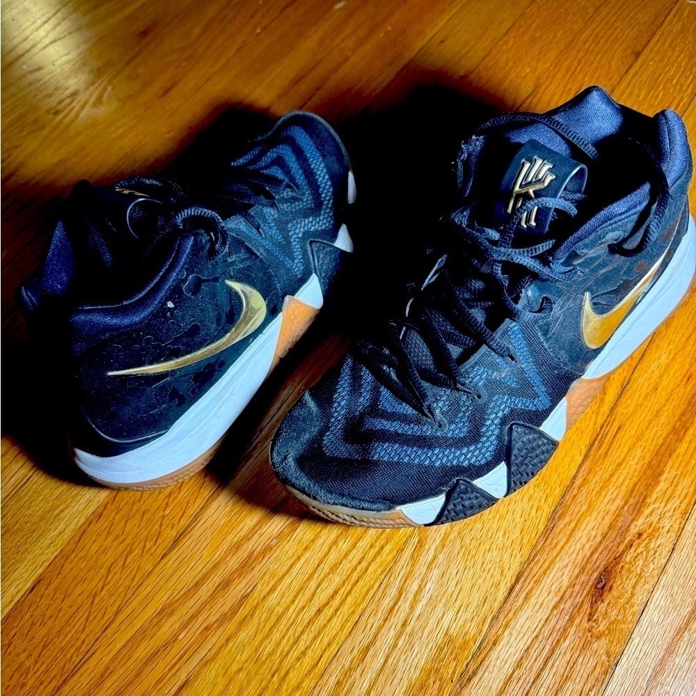 Nike Black and Gold Sneakers Sleek Design